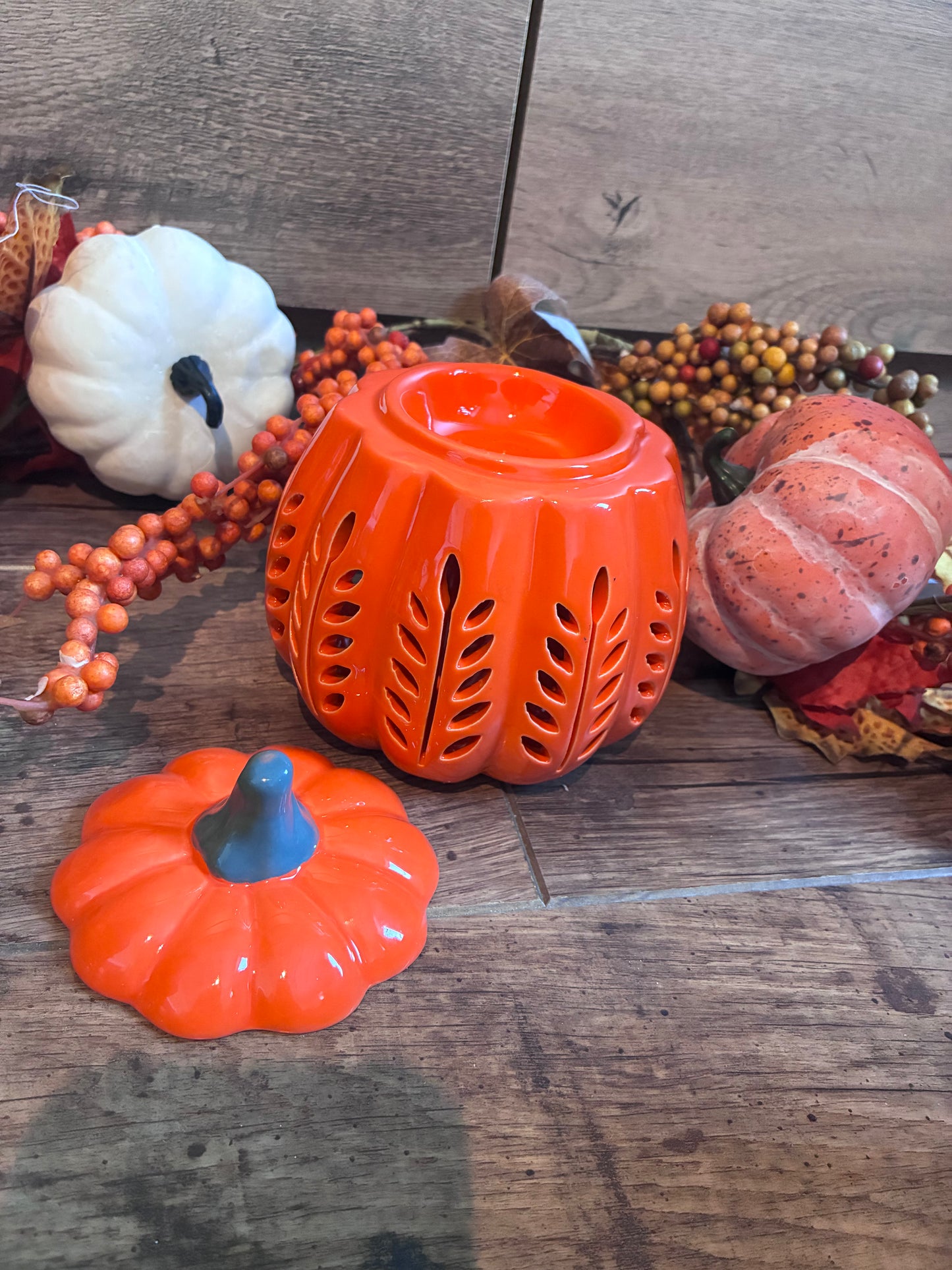 Orange pumpkin cutout wax and oil burner